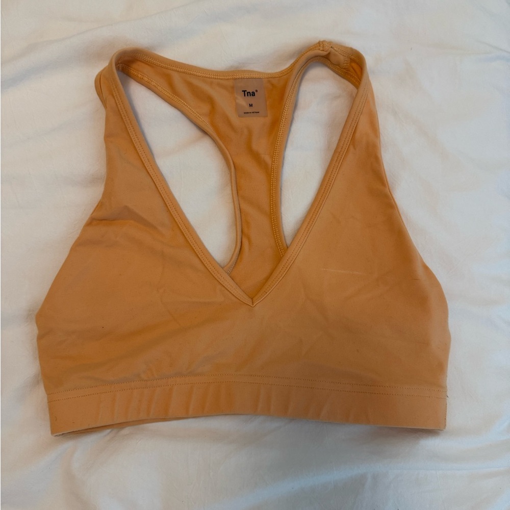 TNA Women's bright orange Sports Bra